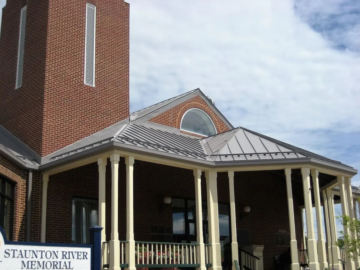 Skilled roofing craftsmen working on a residential roof in Washington Grove